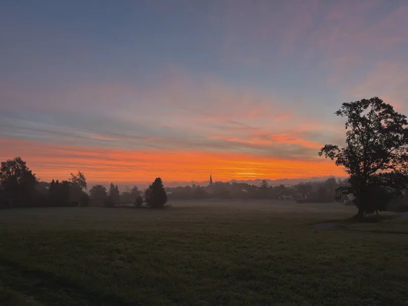 Dawn's Embrace Over the Village